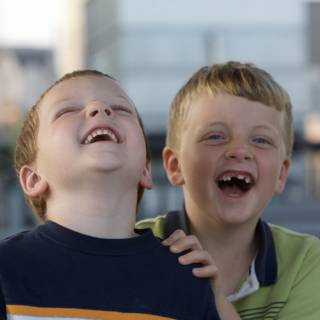 Two Boys Sharing Laughter Together