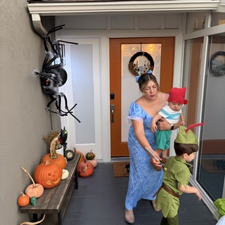 Halloween Family Moment on Decorated Front Porch