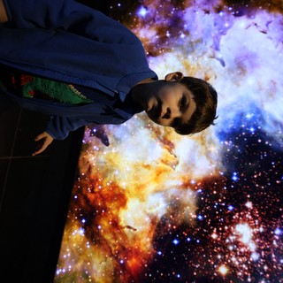Contemplation Beneath the Cosmic Nebula Display