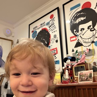 Joyful Toddler's Selfie in Vintage Comic-Themed Room