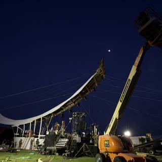Stage Setup with Construction Crane and Tent