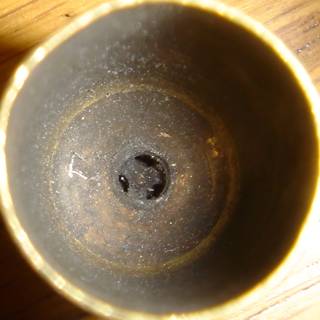 Metal Bowl with a Hole