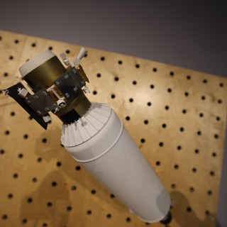 Apollo-Era Spacecraft Model on Pegboard Display