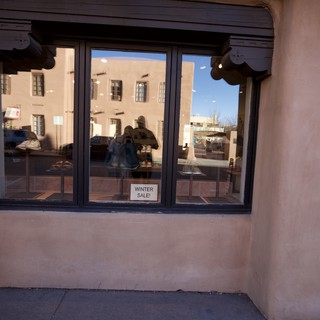 Adobe Storefront Window Display at Sunset in Santa Fe