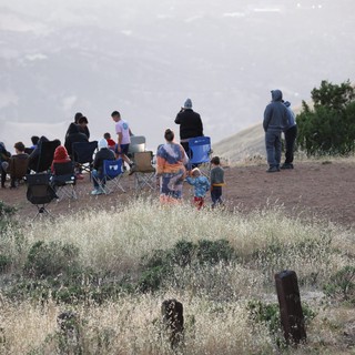 Families Gather at Mountain Overlook at Dusk