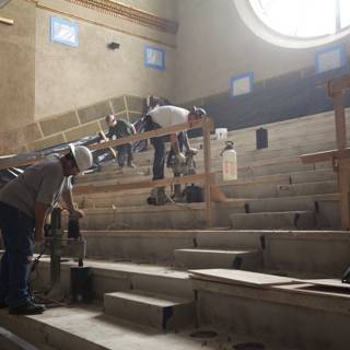 Working on the Stairs in a Building
