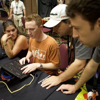 Nick Crompton Working on Laptop