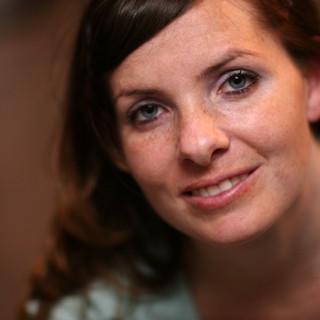 Freckled Smile: Intimate Portrait of a Young Woman