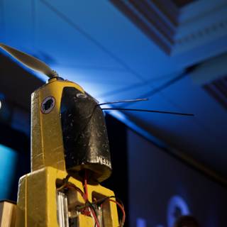 Yellow Robotic Marvel with Propeller