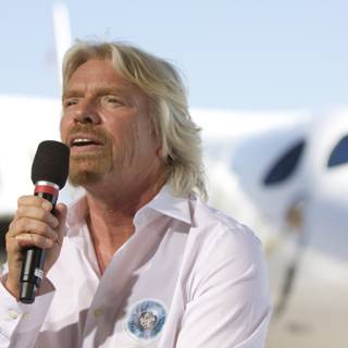 Richard Branson addresses the crowd in front of White Knight Two