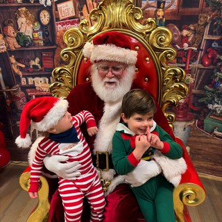 Children Visit Santa in His Christmas Workshop
