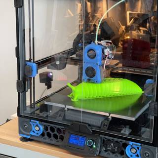 3D Printer Producing Green Object