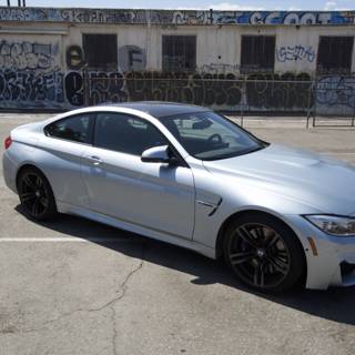 BMW M4 Coupe Parked in Front of Wall