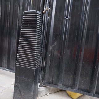 Urban Gate with Ventilation Grille and Yellow Debris
