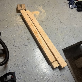 Wooden Planks and Block Arrangement on Garage Floor