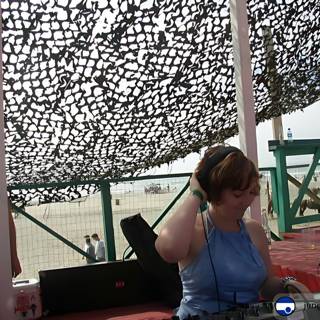 Blue Shirt Woman with DJ at Ensenada's Waterfront