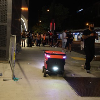 Autonomous Delivery Robot Navigates Nighttime Festival Crowd