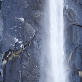 Yosemite Waterfall Cascading Through Granite Cliffs in Winter