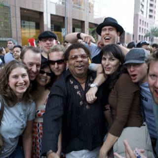 Ozomatli Crowd Poses for a Picture