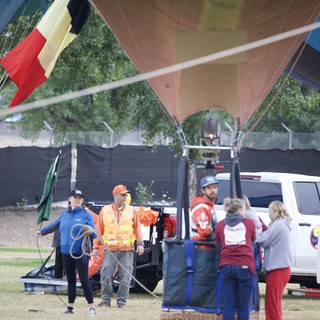 Ground Crew Prepares Hot Air Balloons for Launch