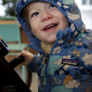 Joyful Toddler in Patagonia Winter Jacket