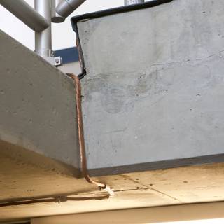 Pipe Attached to Concrete Wall