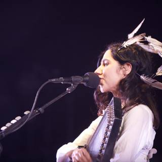 PJ Harvey's Solo Feathered Performance
