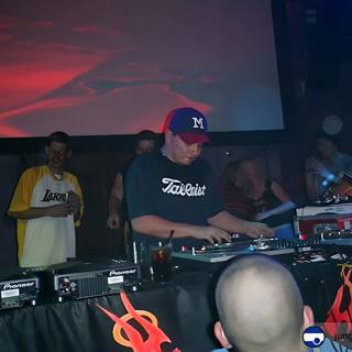 Mix Master Mike Entertains the Crowd in his Baseball Cap