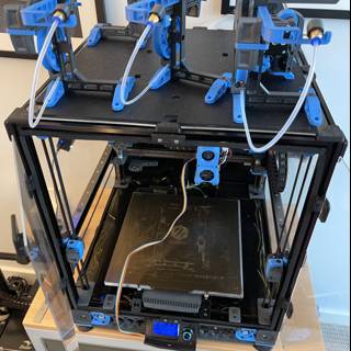 Innovative 3D Printer in Blue and Black Frame