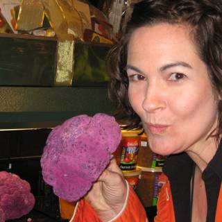 Woman Holds a Mysterious Purple Rock