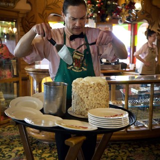 Cast Member Preparing Rice Crispy Treat at Disney Restaurant