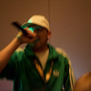 Green-Jacketed Singer on Stage