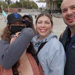 Joyful Group Reunion in Public Plaza