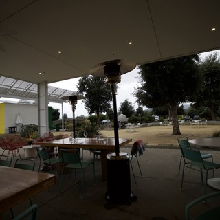 Modern Outdoor Dining Patio with Heat Lamps