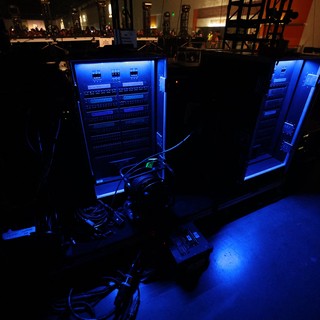 Blue-Lit Audio Rack Systems Backstage at Wobbleland