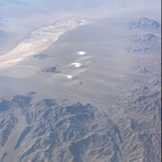 Aerial View of Stunning Desert and Mountain Range