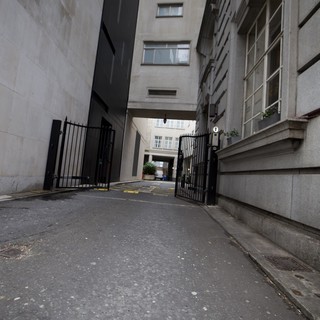 Narrow Urban Alleyway Between Modern London Buildings