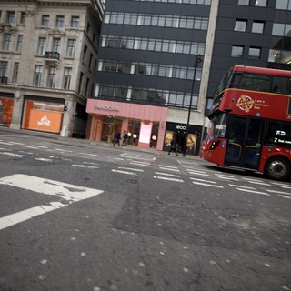 Rainy London Street Scene with Red Double-Decker Bus