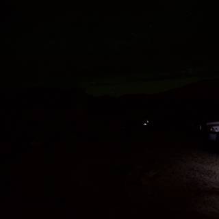 Illuminated Truck in the Night Sky