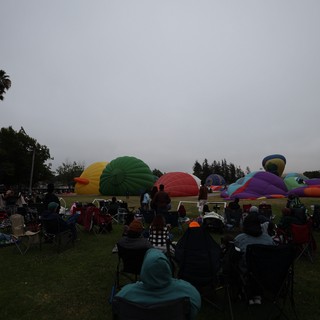 Hot Air Balloons Inflate at Dawn Balloon Festival
