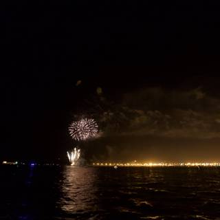 Sparkling Fireworks Over the Water