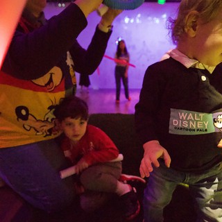 Children Playing with Light Toys at Baby Rave Event