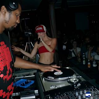 DJing Duo in Red
