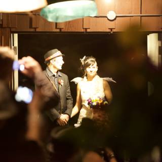 The Newlyweds at Their Front Door