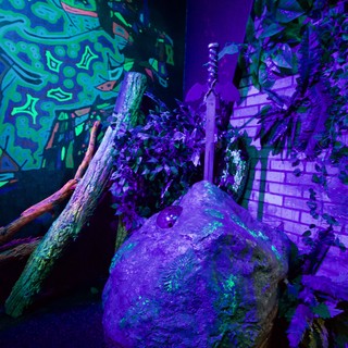 UV Illuminated Graffiti Wall in Psychedelic Art Installation