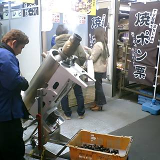 Working on the Machine at Okachimachi Market