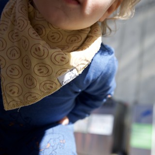 Young Child in Handmade Smiley Face Bandana