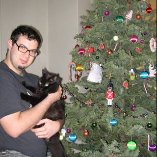 Dave B celebrates Christmas with his feline friend