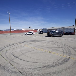 Tire Marks on Empty Parking Lot at USS Hornet