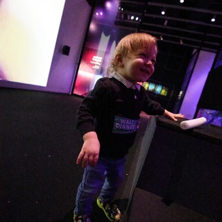 Joyful Toddler at Baby Rave Event